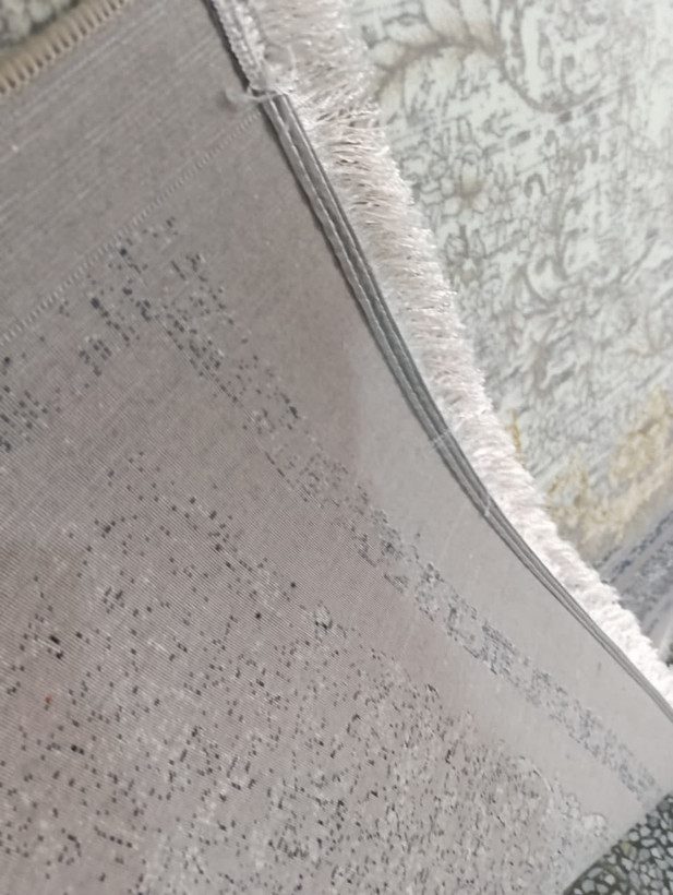 نمای پشت فرش طاها